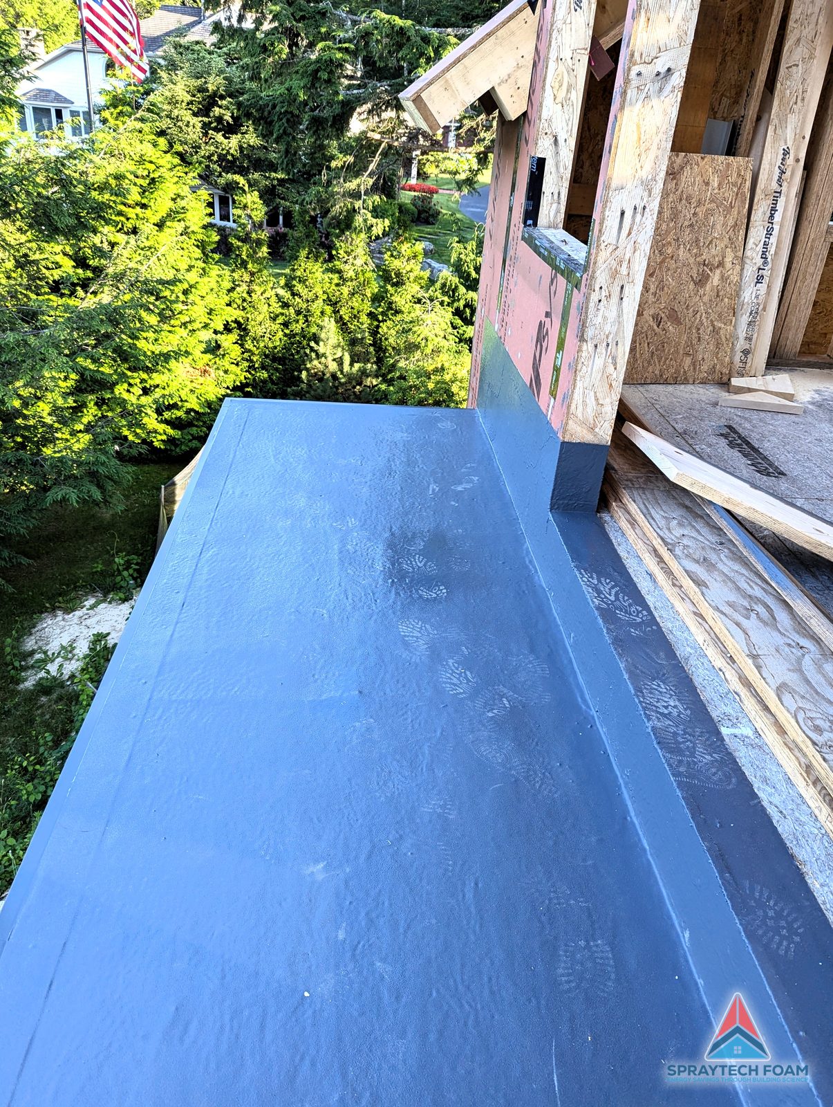 Polyurea-coated balcony with drip edge detail